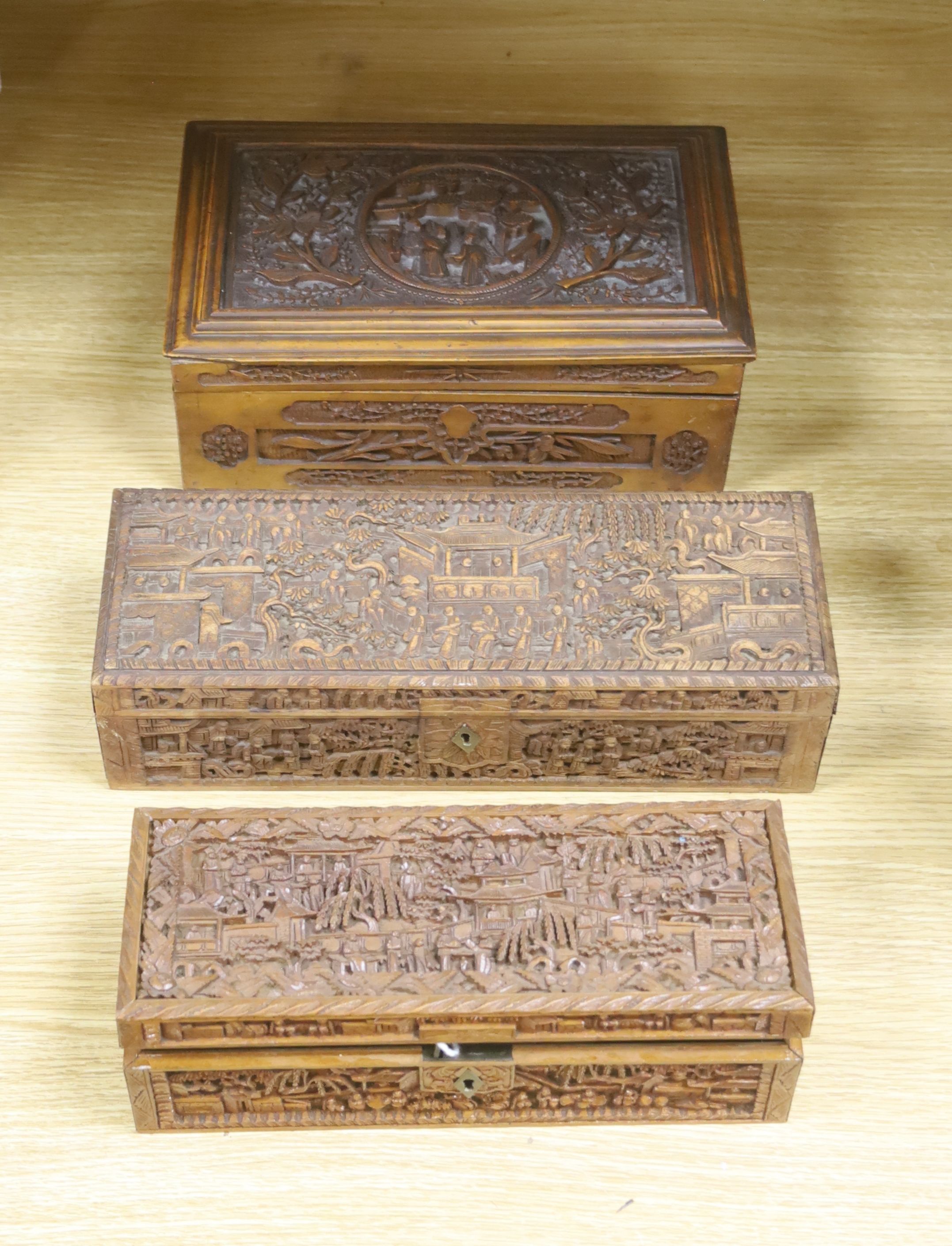 Three 19th century Chinese carved sandalwood boxes, 19th/20th century, longest 30cm